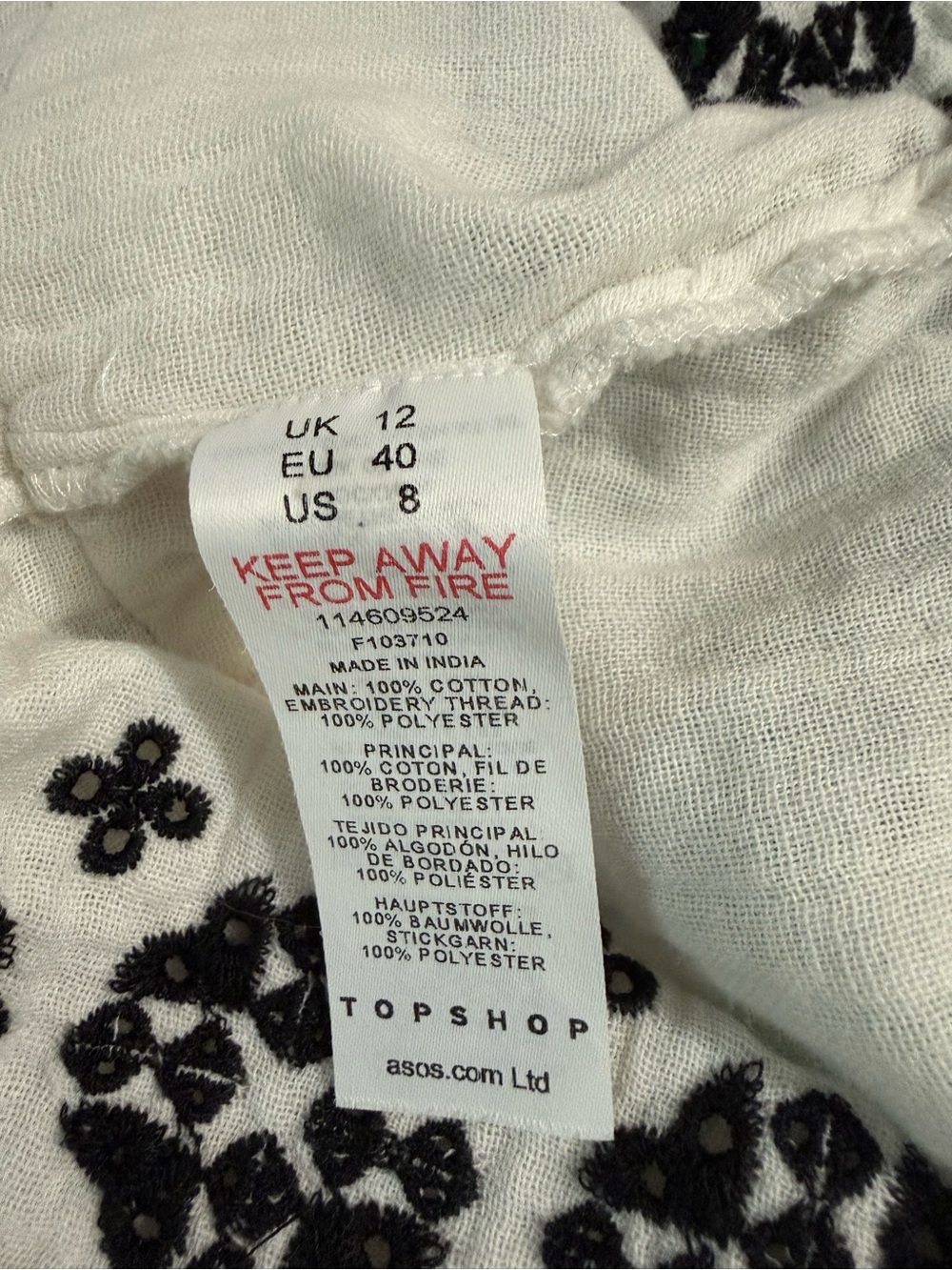 White Embroidered Peasant Dress with Black Floral Motif - Picture 4 of 4